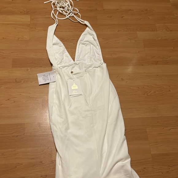 Brand new white halter gown with tie in back . Zipper in back with - Picture 13 of 15